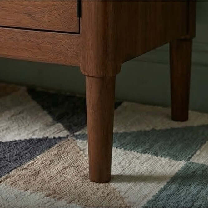 Close up of the sturdy hardwood leg on the Fishe & Lilly Norway Dark Walnut TV Stand & Media Unit.