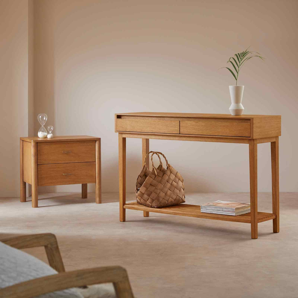 Fishe & Lilly Melia Console Table with Two Drawers in natural hardwood, featuring a slatted lower shelf and woven basket.