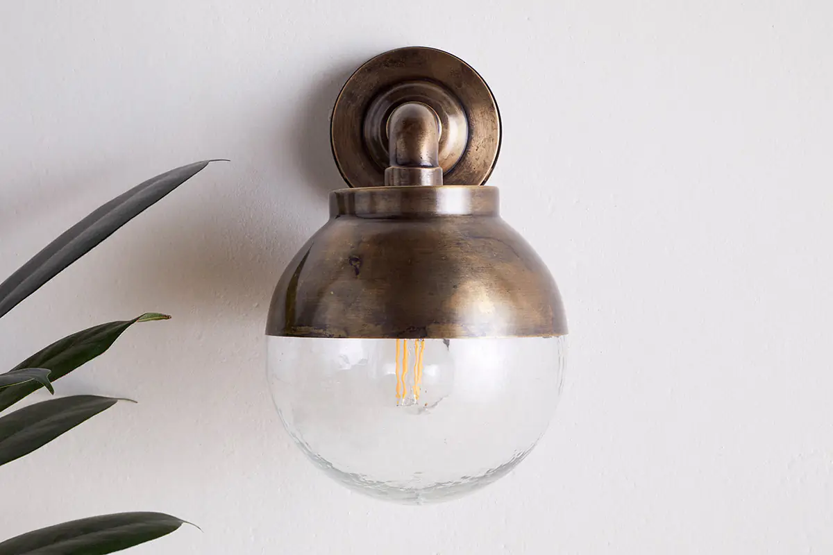 Nkuku - Abeo Outdoor Wall Lamp - Antique Brass