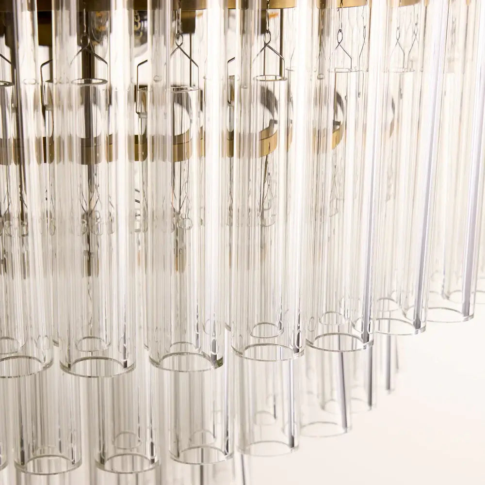 Pooky Astrid Chandelier in Clear Glass showcasing elongated glass rods in a balanced silhouette.