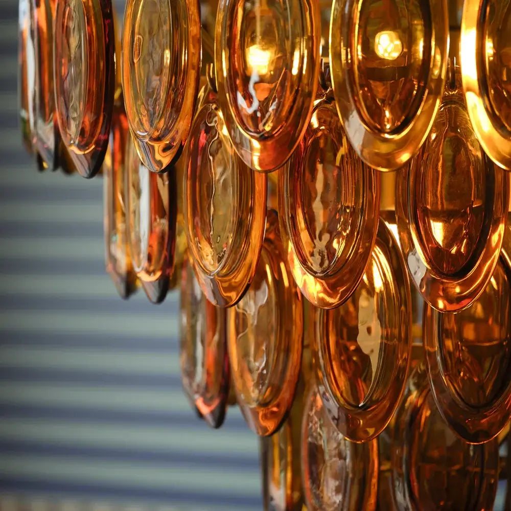 SALE Pooky Lyle Chandelier in amber glass featuring elegant amber glass drops reflecting light.