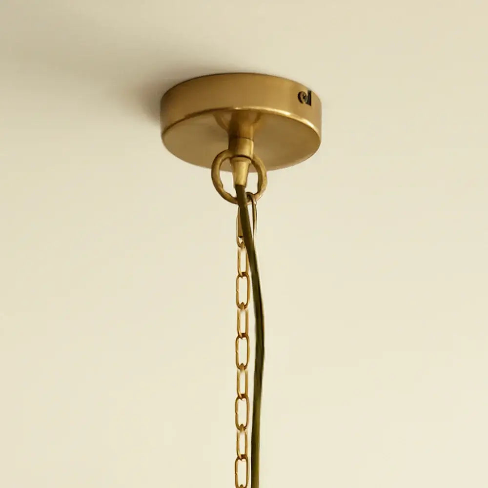 Ceiling rose and chain for SALE Pooky Lyle Chandelier in amber glass installation.