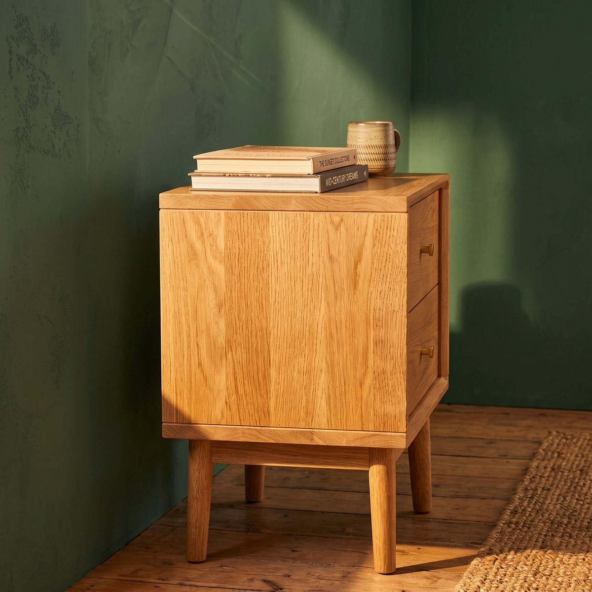 Fishe & Lilly Wright Oak Bedside Table. Minimalist Scandi design with two deep drawers and tapered legs.