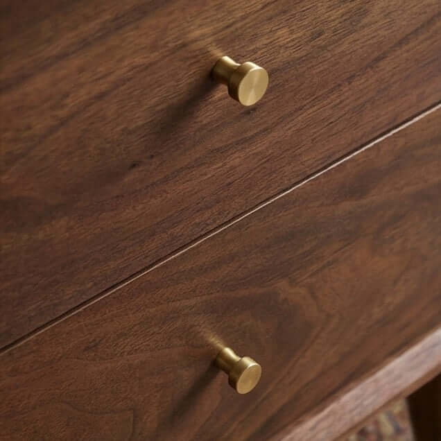 Close-up of the polished brass hardware and wood grain drawers on the Fishe & Lilly Wright Walnut Bedside Table.