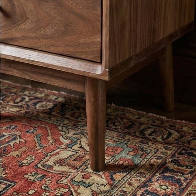 Mid-century legs and rich wood grain detail on the Fishe & Lilly Wright Walnut Bedside Table.