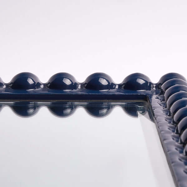 Pooky - Charming Mirror - Navy close-up showing playful carved wooden frame and navy resin details.