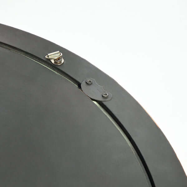 Close-up of the attachment mechanism of Pooky - Smaller Cinders Mirror - Blue showcasing its high-quality details.