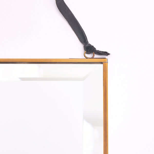 Pooky - Rectangular Bevelled Luxor Mirror - Rectangular Luxor top view with elegant brass frame and black velvet tape.