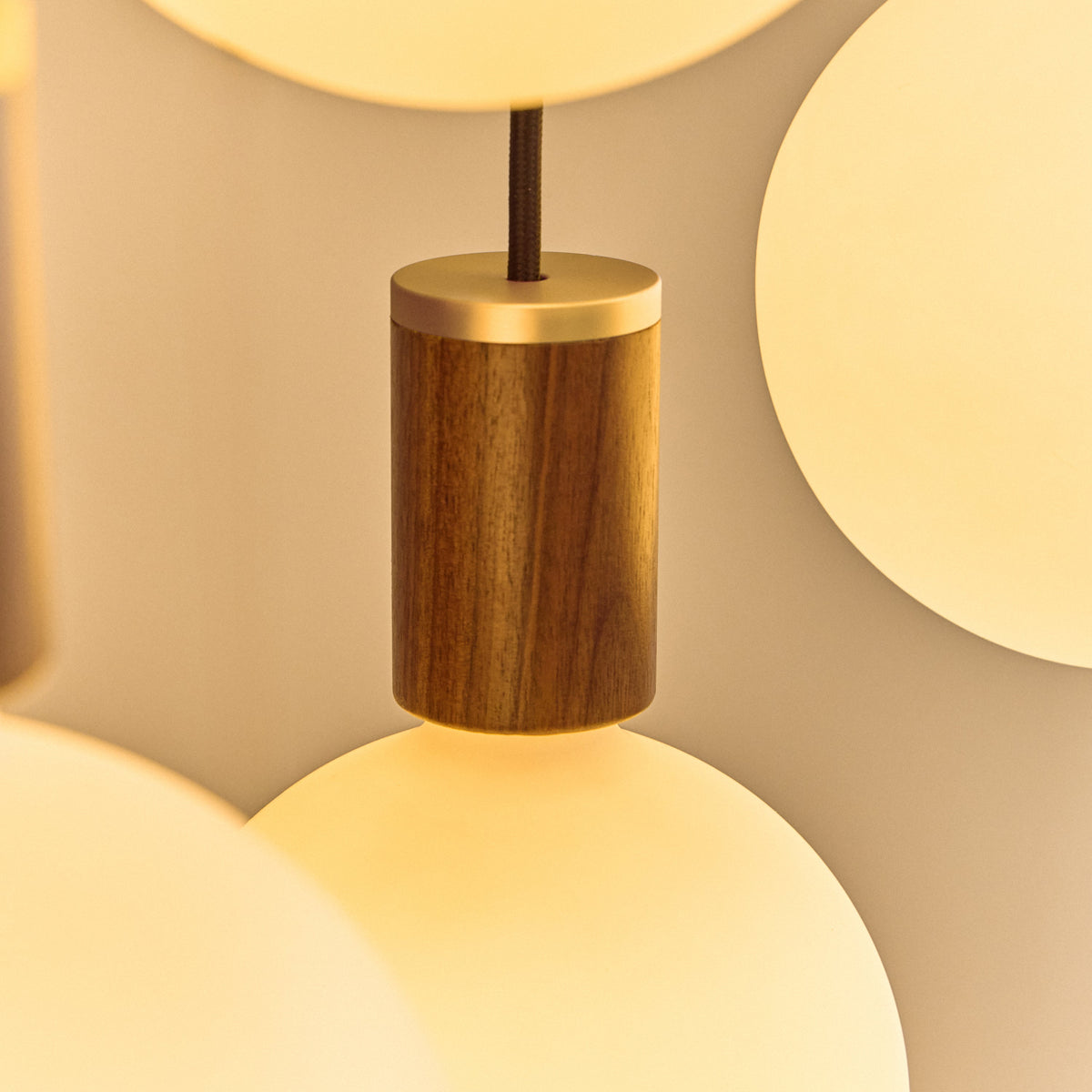 Tala Oval Dim-to-Warm Pendant Light in Walnut