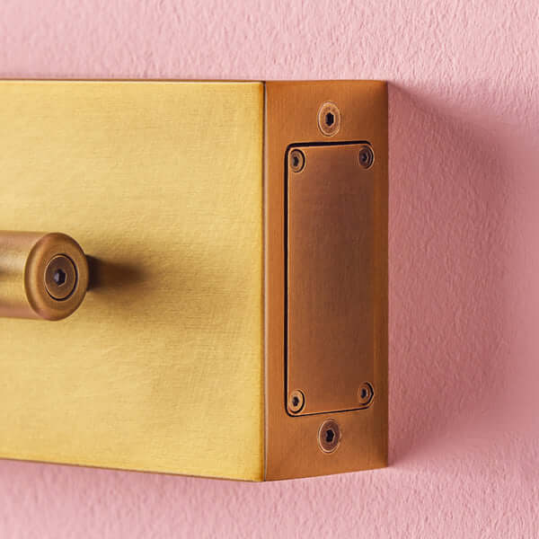 Pooky - Regular Blake Rechargeable Picture Light - Brass battery pack detail on wall in antique brass finish.