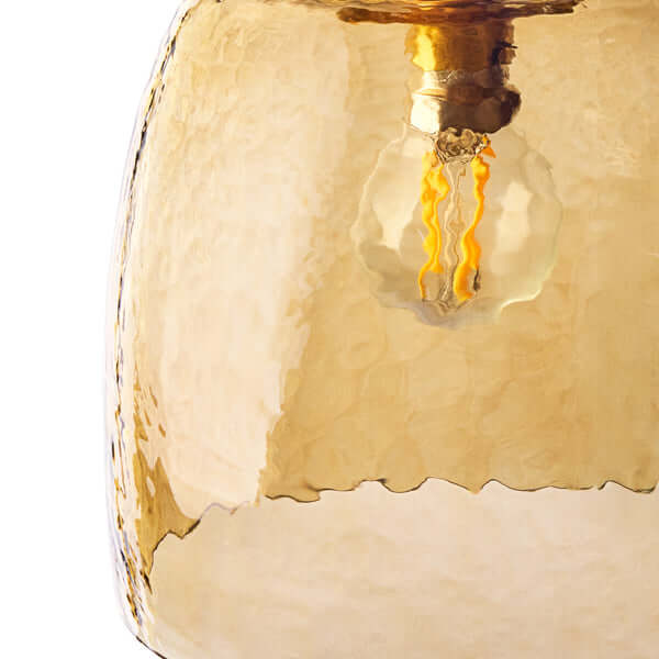 Pooky - Rory Pendant Shade - Honey Hammered Glass close-up showing the soft, organic texture and warm light.