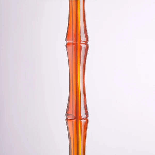 Close up of Pooky - Bamboo Floor Lamp Base - Amber Polished Resin - Without Lampshade