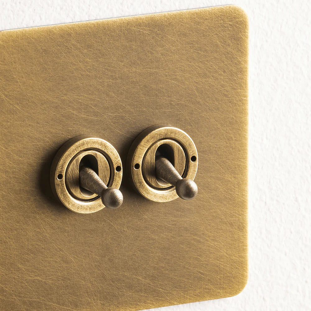 Pooky Lucian Two Gang Intermediate Toggle Switch in Aged Brass