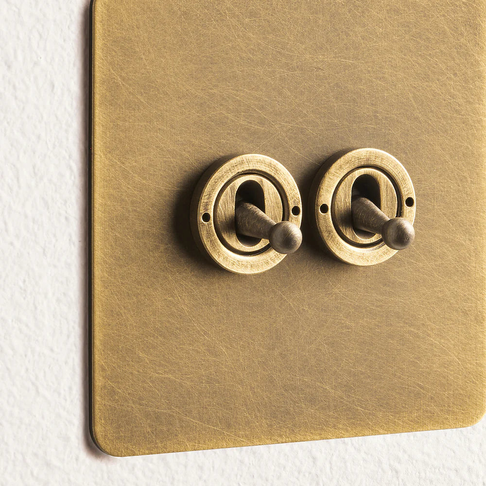 Pooky Lucian Two Gang Intermediate Toggle Switch in Aged Brass