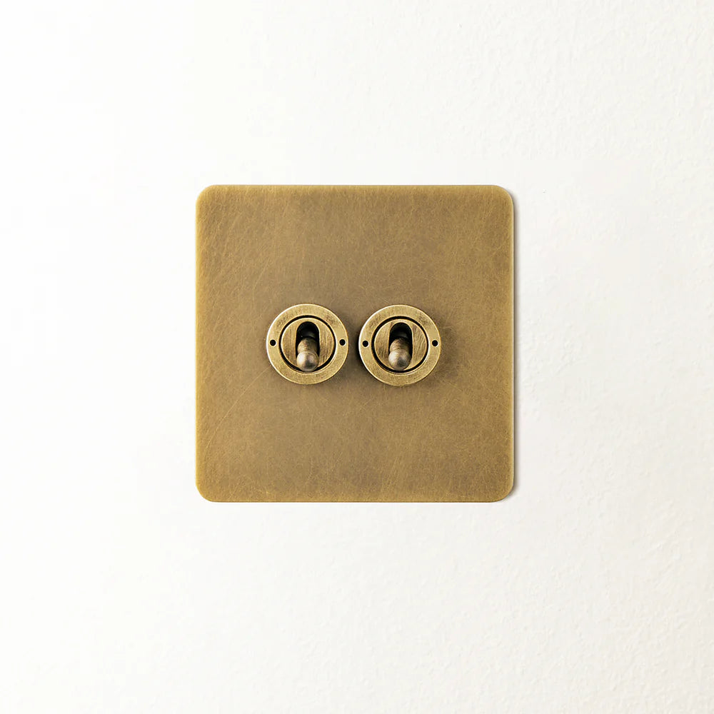 Pooky Lucian Two Gang Intermediate Toggle Switch in Aged Brass