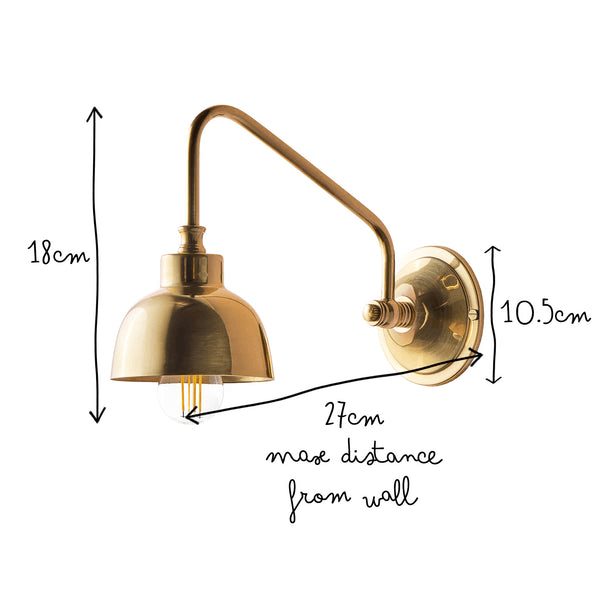 Pooky - Carmel Wall Light - Antiqued Brass Finish showing dimensions of 18cm height, 27cm max distance from wall, and 10.5cm wall mount.