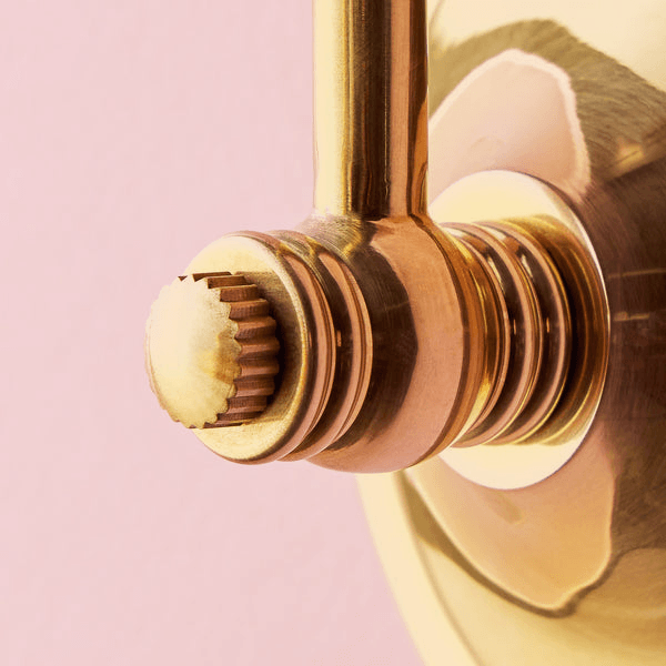 Pooky - Carmel Wall Light - Antiqued Brass Finish close up of the dimmer switch on the stylish wall arm.