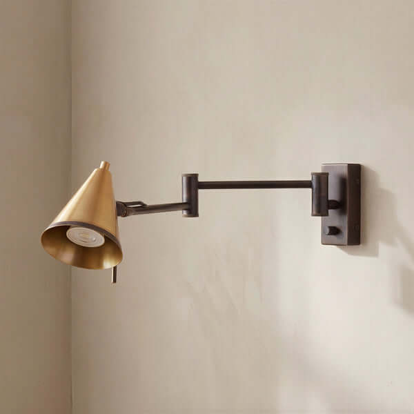 Pooky - Conrad Articulated Wall Light in Bronze with Brass Hood - Bronze and Brass mounted on a wall.