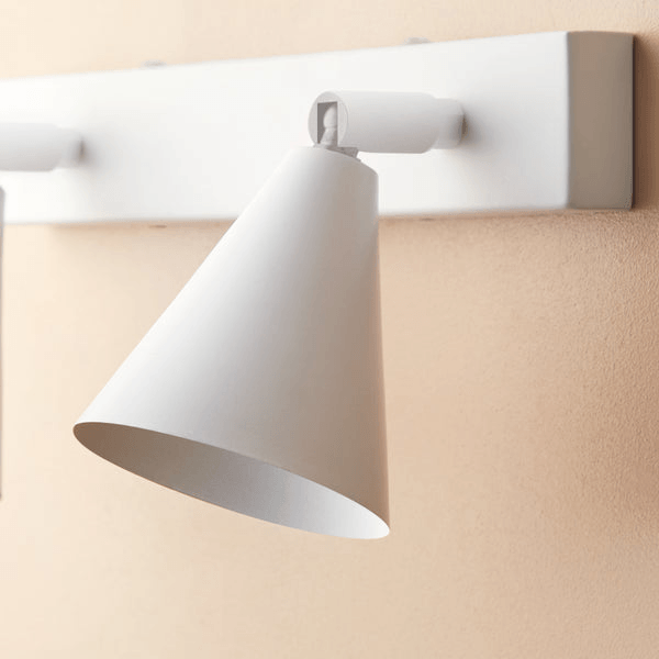 Pooky - Crick Double Wall Spotlight - Paintable Finish in white, mounted on a wall.