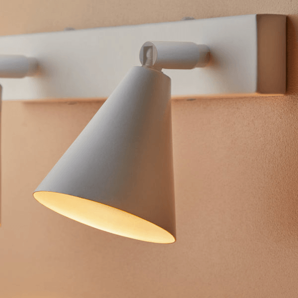Pooky - Crick Double Wall Spotlight - Paintable Finish in a modern setting, showcasing its elegant design and versatility.