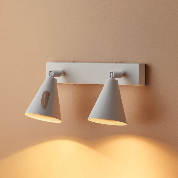 Pooky - Crick Double Wall Spotlight - Paintable Finish mounted on wall with warm lighting.