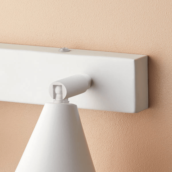Pooky - Crick Triple Wall Spotlight - Paintable Finish mounted on wall showcasing adjustable design and sleek white color.