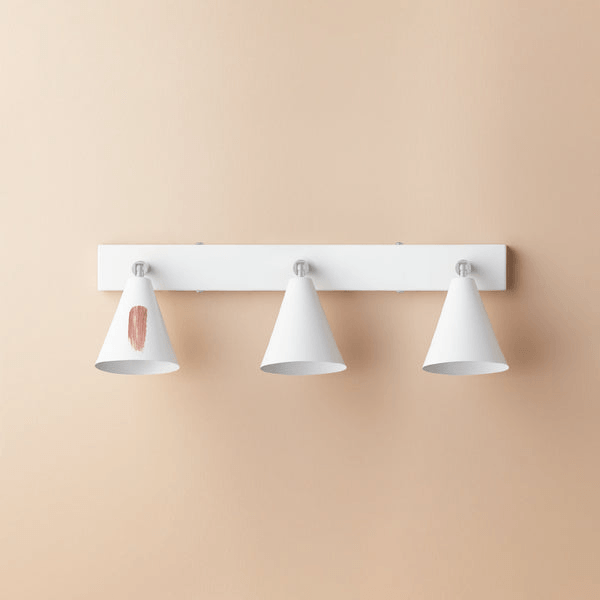 Pooky - Crick Triple Wall Spotlight - Paintable Finish showcasing multi-directional lighting options on a beige wall.