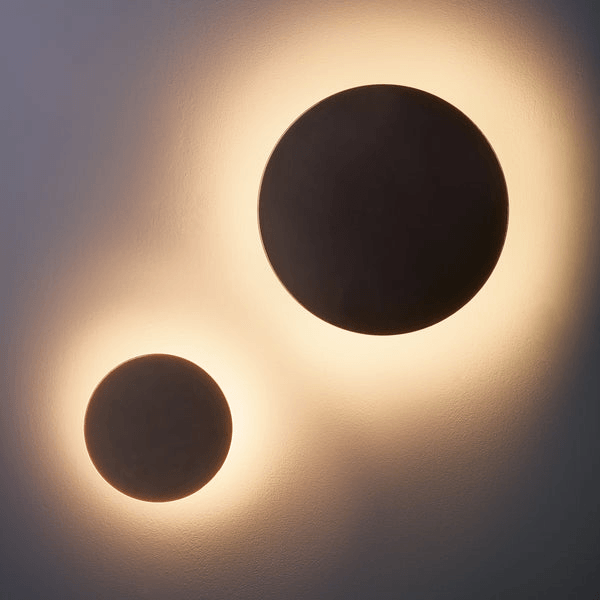 Pooky - Helios Ip44 Wall Light - Smaller - Brushed Bronze Aluminium wall sconces with warm glow.