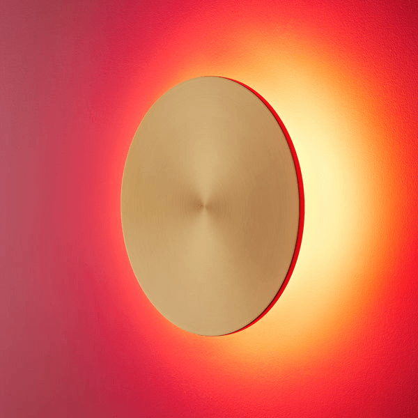 Pooky - Helios Ip44 Wall Light - Larger - Brushed Gold Aluminium with warm glow effect on wall.