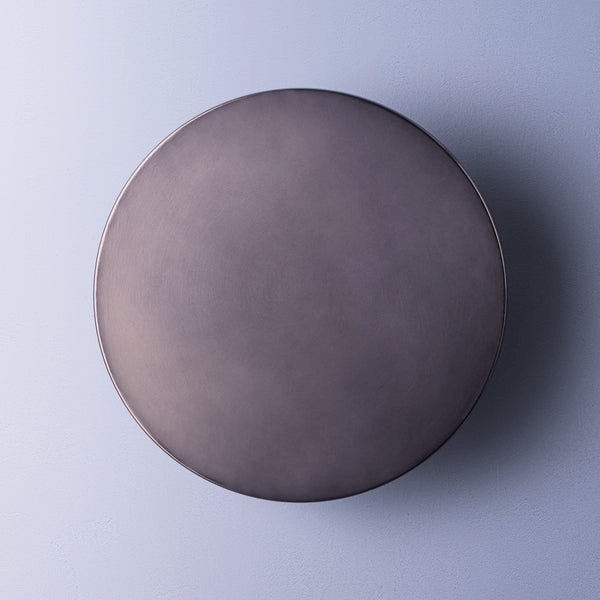 Pooky - Helios Ip44 Wall Light - Largest - Bronze Aluminium mounted on wall, showcasing its elegant design.