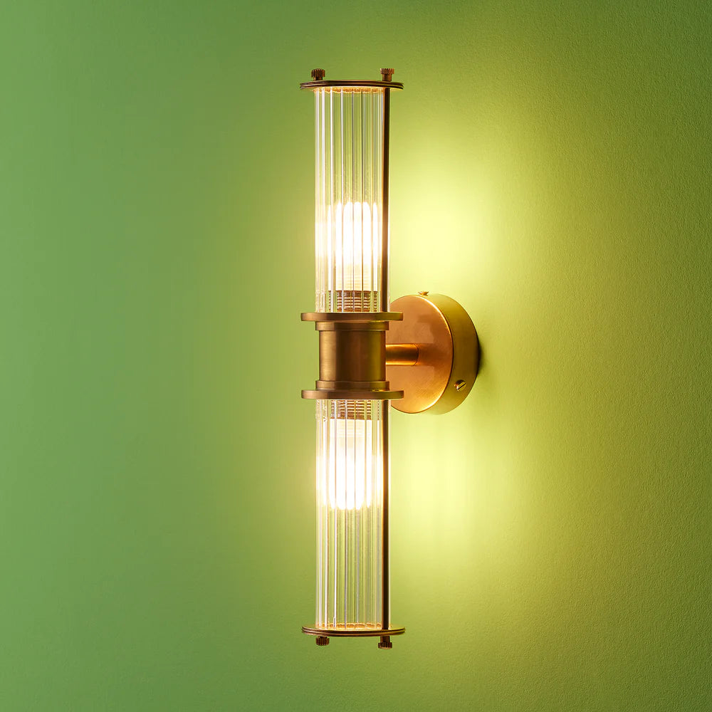 Pooky Hunter IP44 wall light in brass and glass