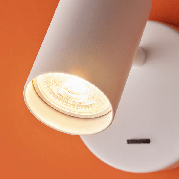 Pooky - Lewis single Wall Light - White - With switch showcasing a modern design and adjustable light beam.