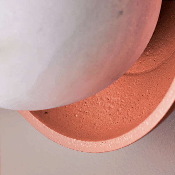 Close-up of Pooky - Luna Wall Light - Terracotta Finish showcasing the alabaster globe and terracotta dish.