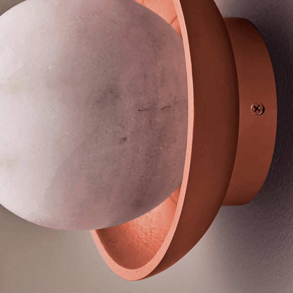 Pooky - Luna Wall Light - Terracotta Finish close-up showing alabaster globe in ceramic dish.
