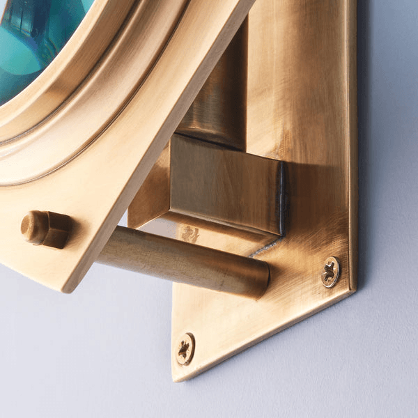 Pooky - Poirot Wall Light - Brass And Glass close-up of the brass fitting and large magnifying glass.