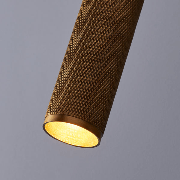 Pooky - Quantum Double Wall Light - Antiqued Brass featuring knurled texture and warm glow.