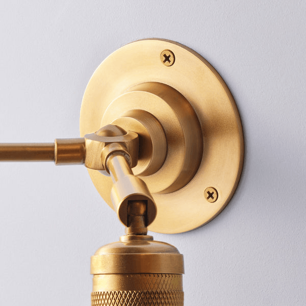 Pooky - Quantum Double Wall Light - Antiqued Brass wall mount close-up with gold finish and adjustable arm.