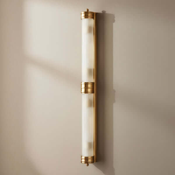 Pooky - Rodtastic ip44 Wall Light - Brass and Frosted Glass mounted on a wall, featuring elegant design and detailing.