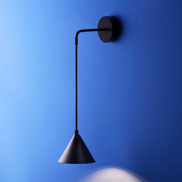 Pooky - Sway Wall Light - Black, stylish black wall light on blue background.