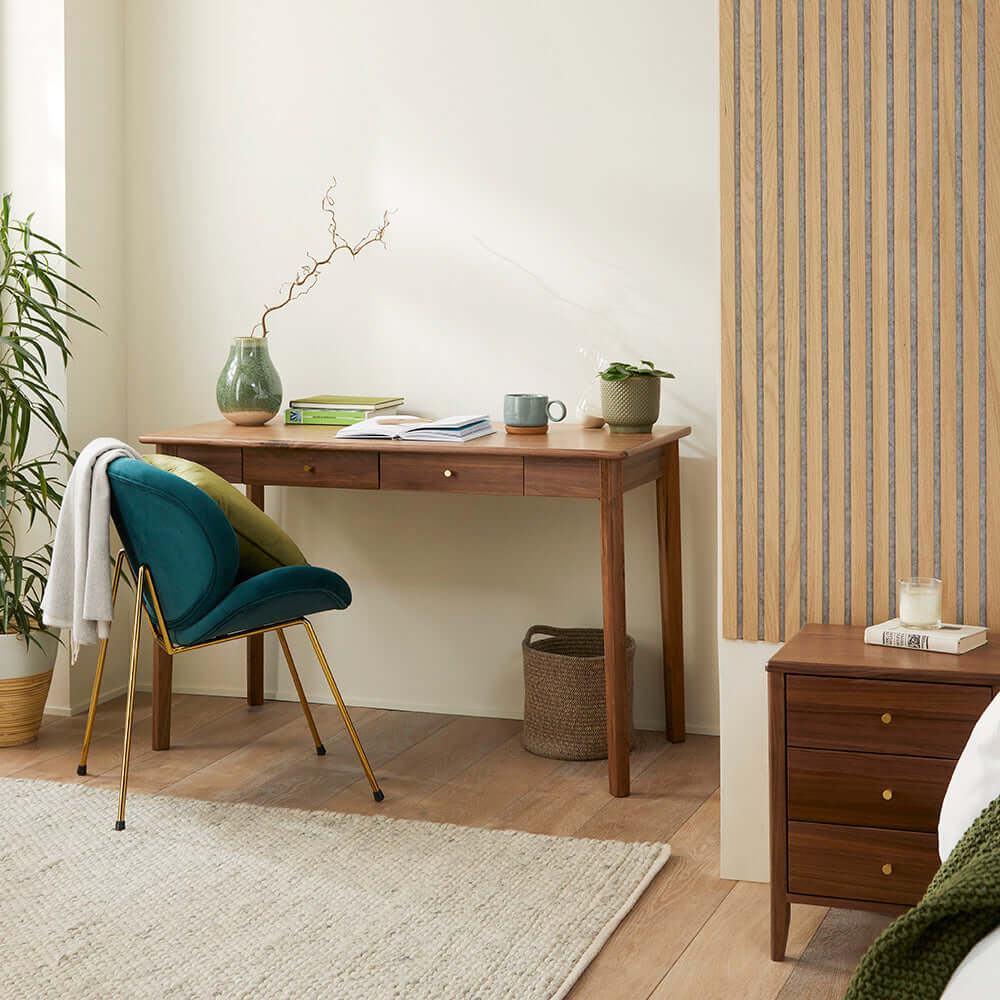 Fishe & Lilly Wright Walnut Desk and Dressing Table in a mid-century home office with a teal velvet chair.