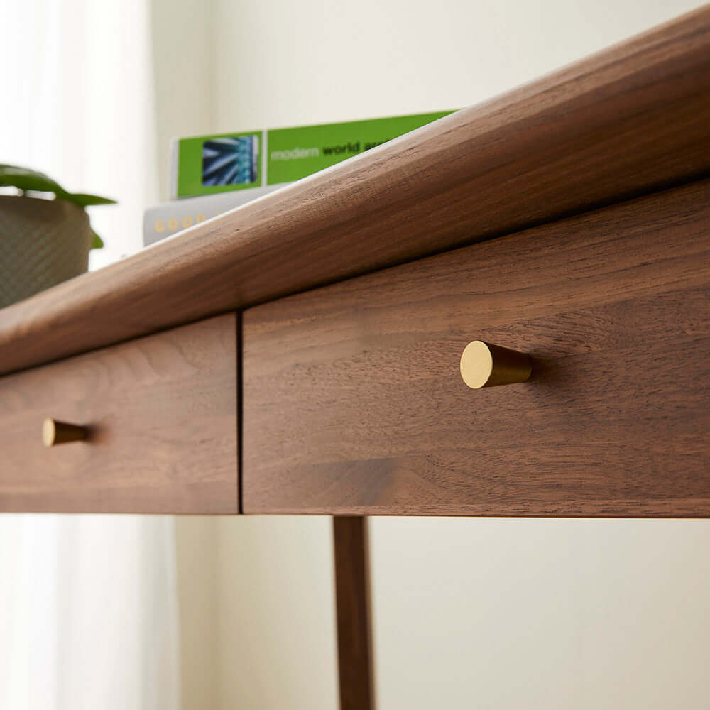 Close-up of Fishe & Lilly Wright Walnut Desk and Dressing Table showcasing its rich dark walnut finish and elegant drawer knobs.