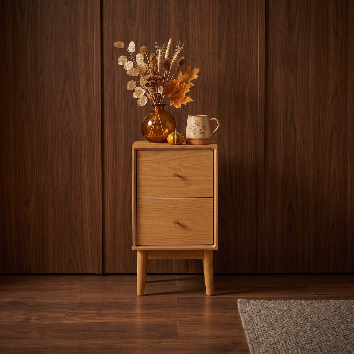 Fishe & Lilly Wright Narrow Oak Bedside Table with 2 drawers and solid oak legs, styled with fall decor.