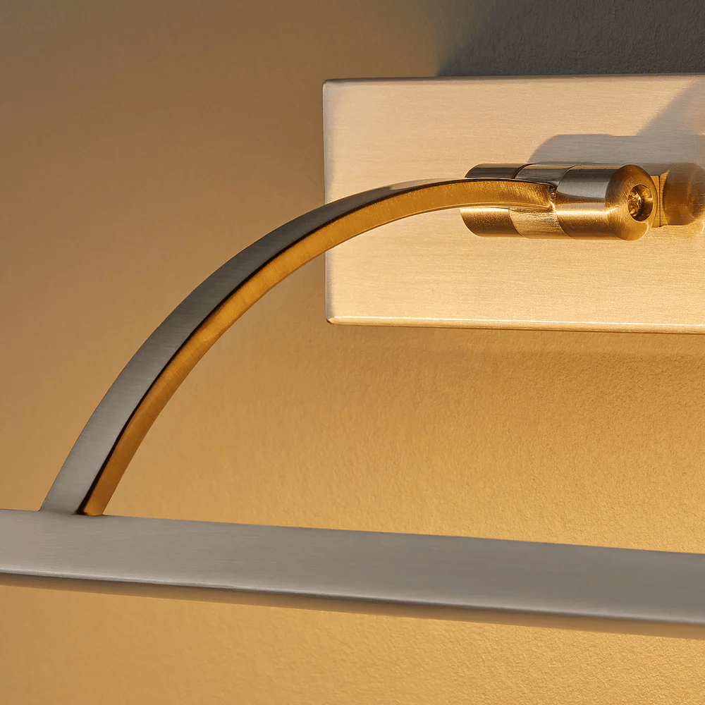 Pooky - Blake Dimmable Picture Light - Medium - Brushed Chrome Finish close-up of arm and fixture detail.
