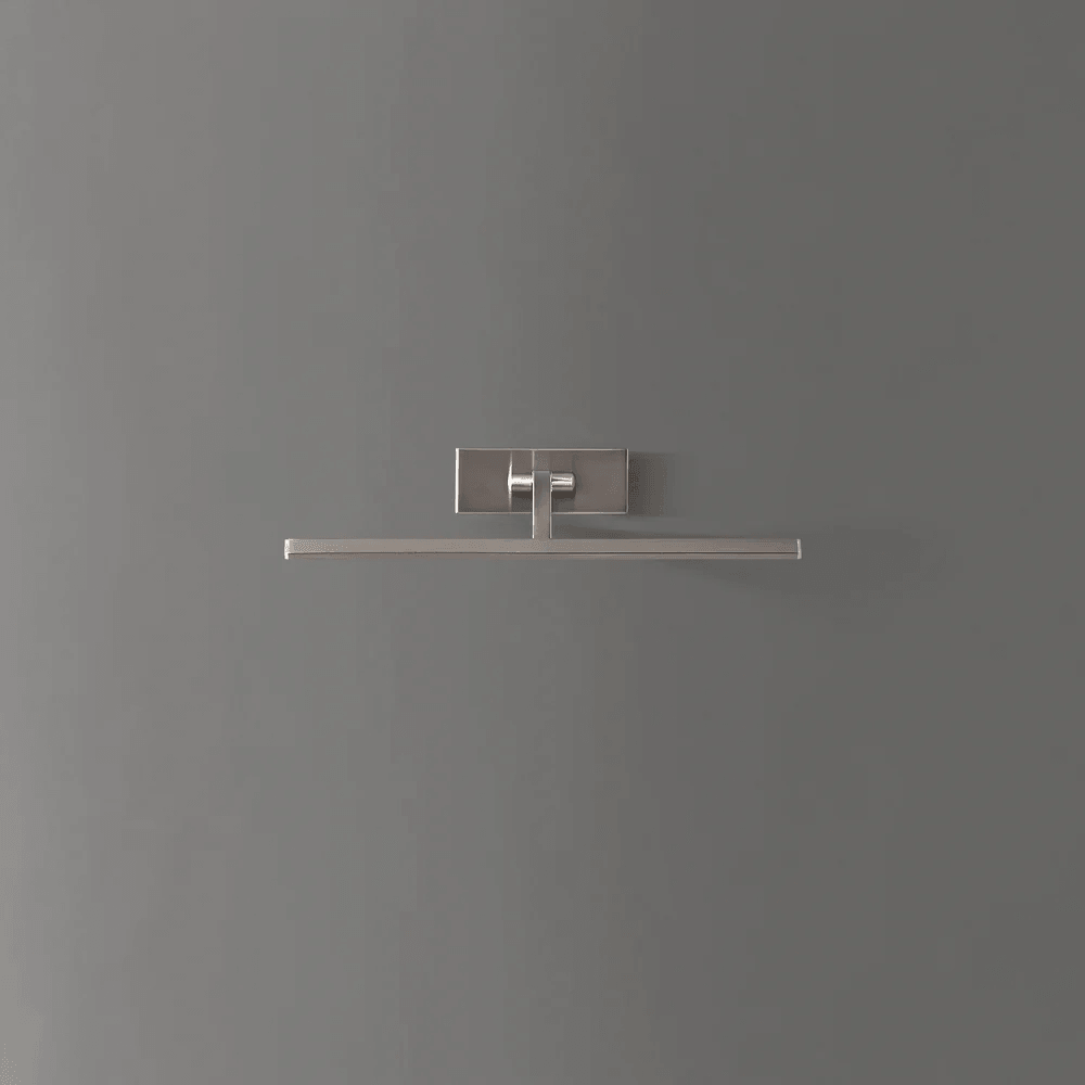 Pooky - Blake Dimmable Picture Light - Smaller - Brushed Chrome Finish mounted on a gray wall.
