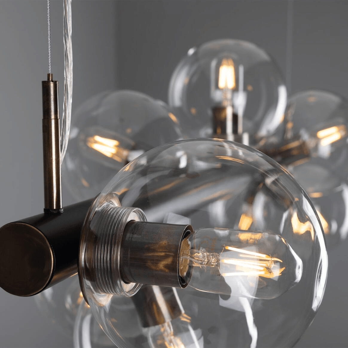 Mullan Moriarty Linear Island Pendant Light Nine-Light - Powder-Coated Matte Black and Antique Brass Finish