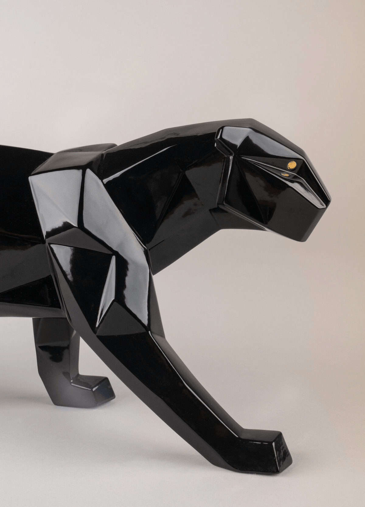 Lladró - Panther Sculpture - Glazed Black made of porcelain with a glossy finish in striking black color.