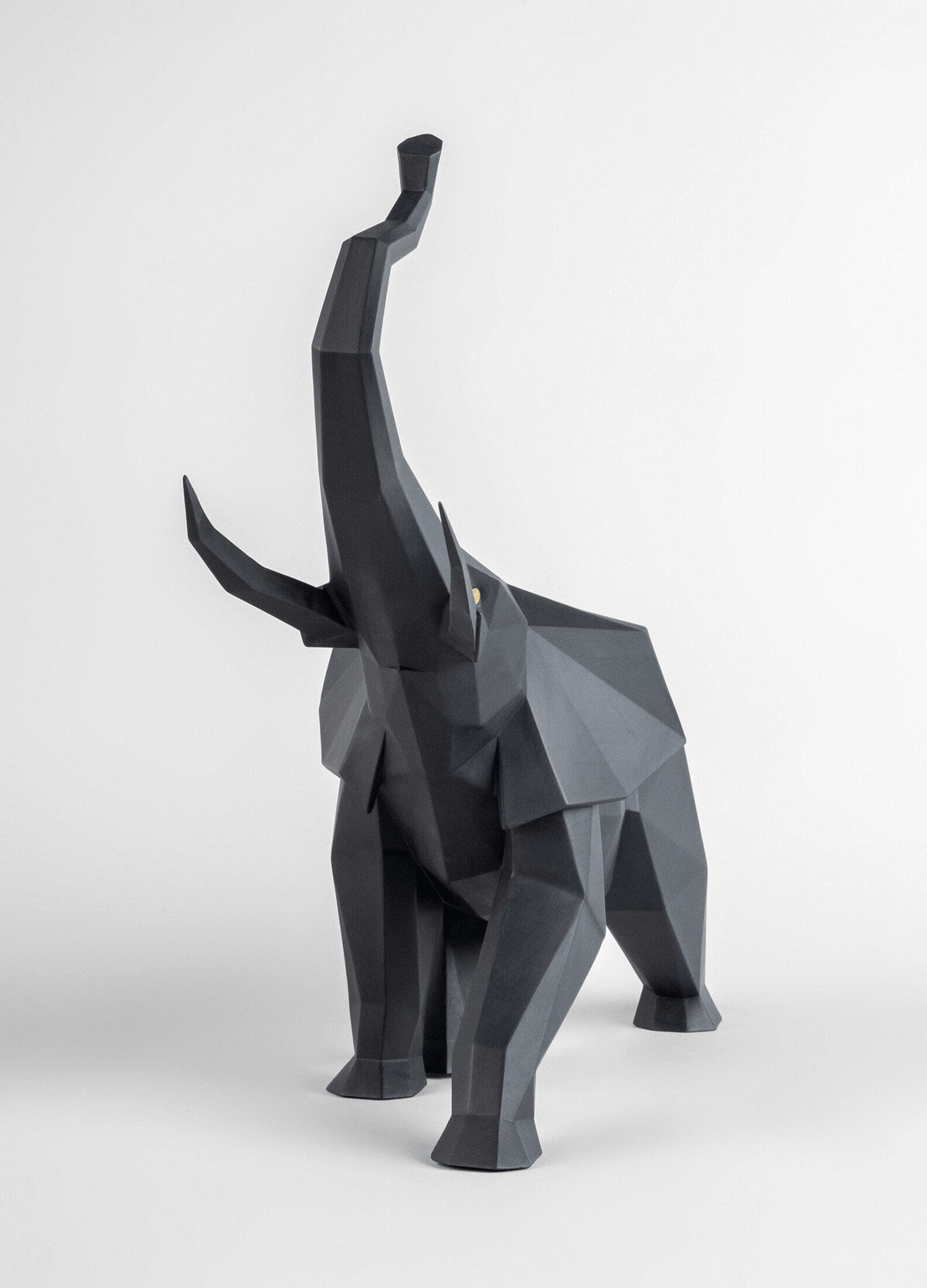 Lladró - Elephant Sculpture - Black matte, porcelain geometric design, symbolizing luck and prosperity.