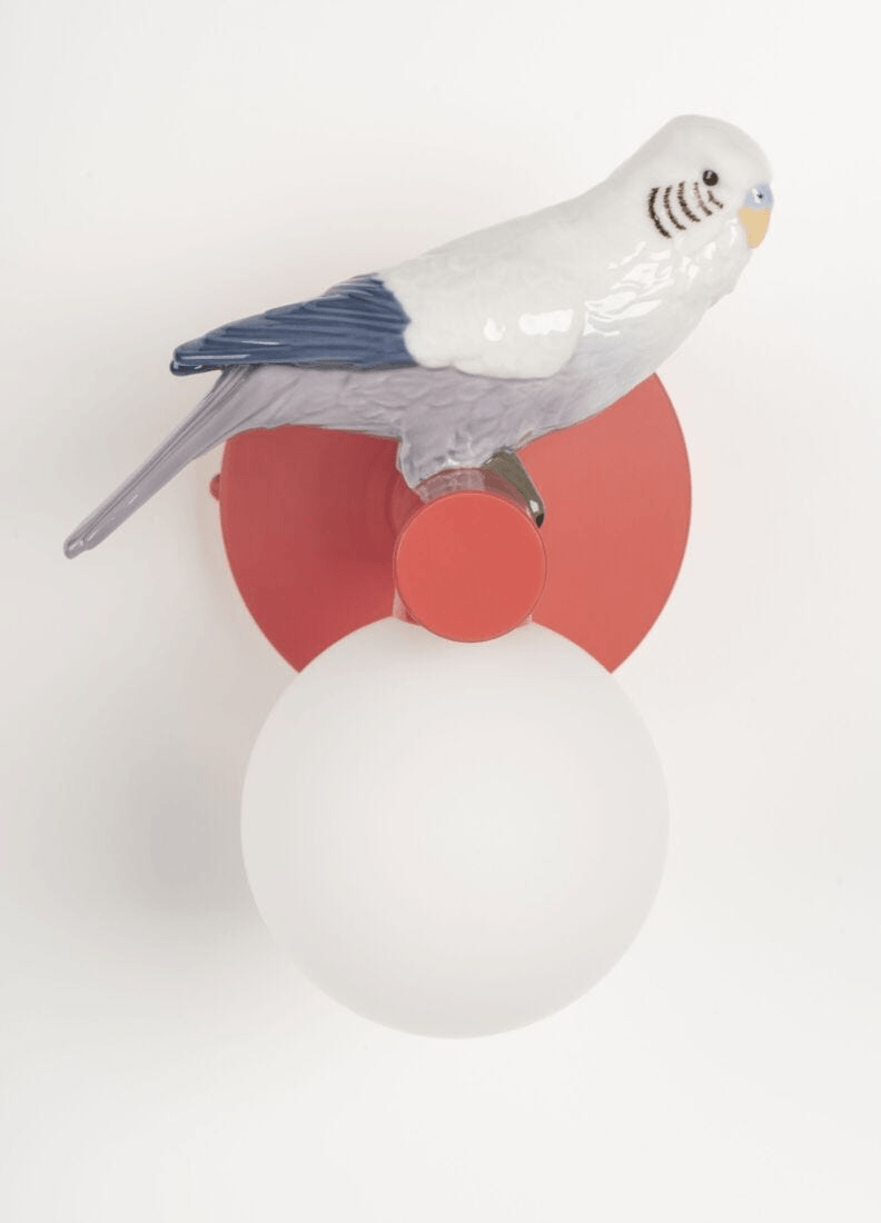 Lladró - Parrot Wall Sconce - Red featuring a porcelain parrot design on a red mount.