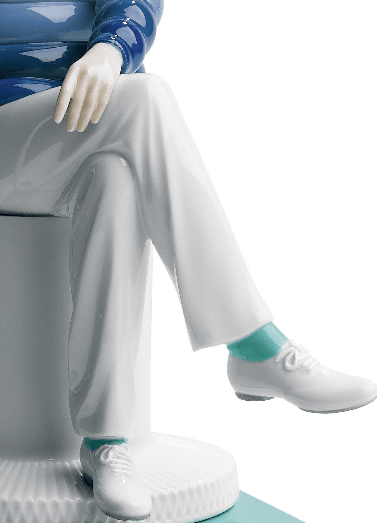 Lladró - The Lover I Sculpture detail showcasing porcelain design and stylish footwear.