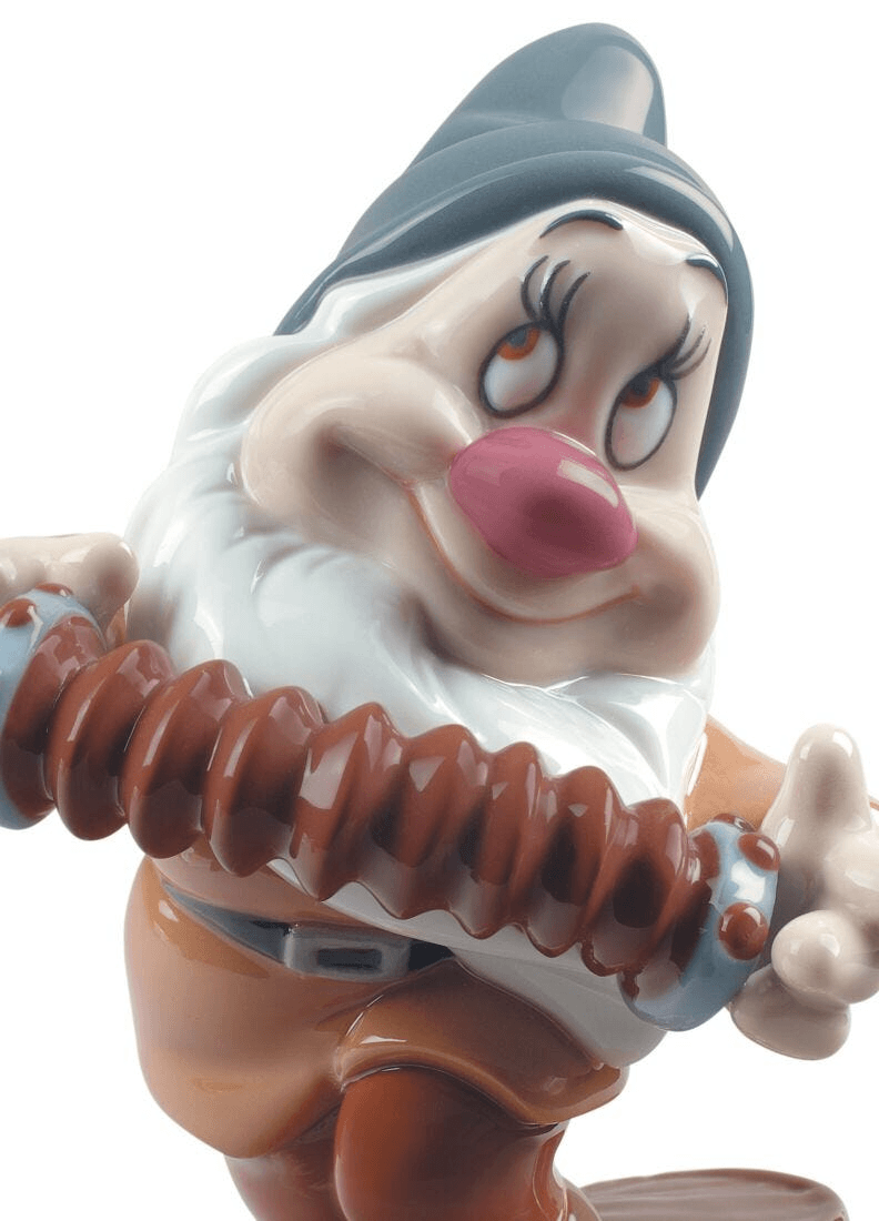 Lladró - Bashful Snow White Dwarf Figurine, a detailed porcelain sculpture of Bashful the dwarf.